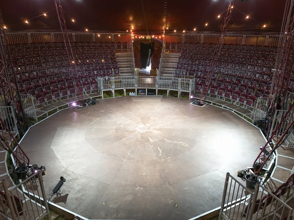 The ring floor with the grandstand all around it